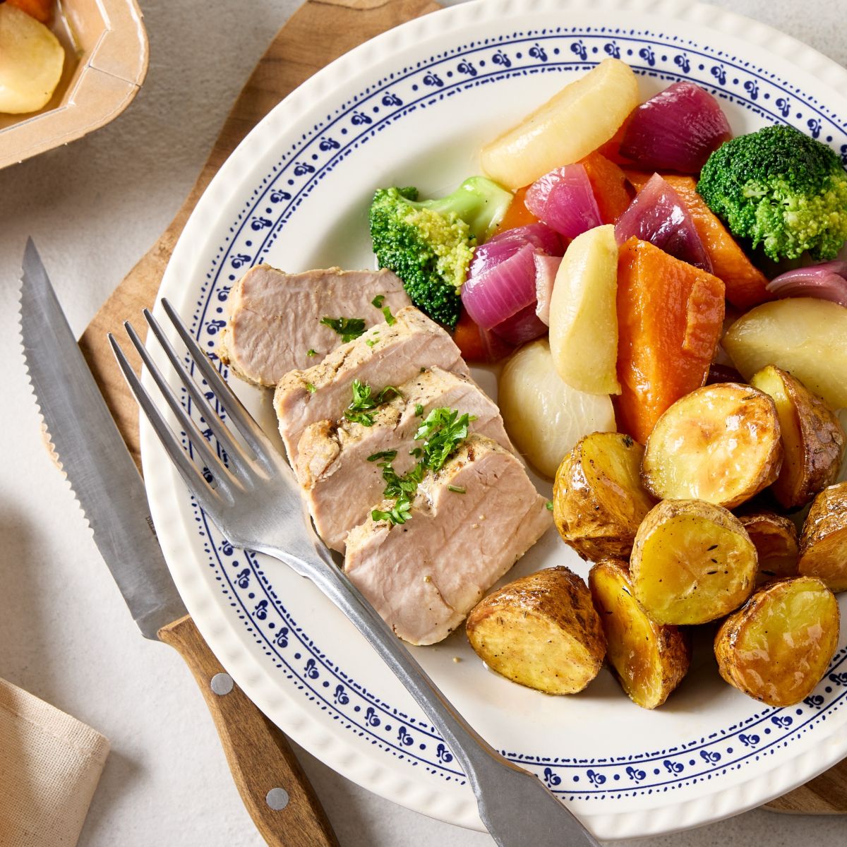 Filet de porc avec légumes glacés et pommes de terre SQ